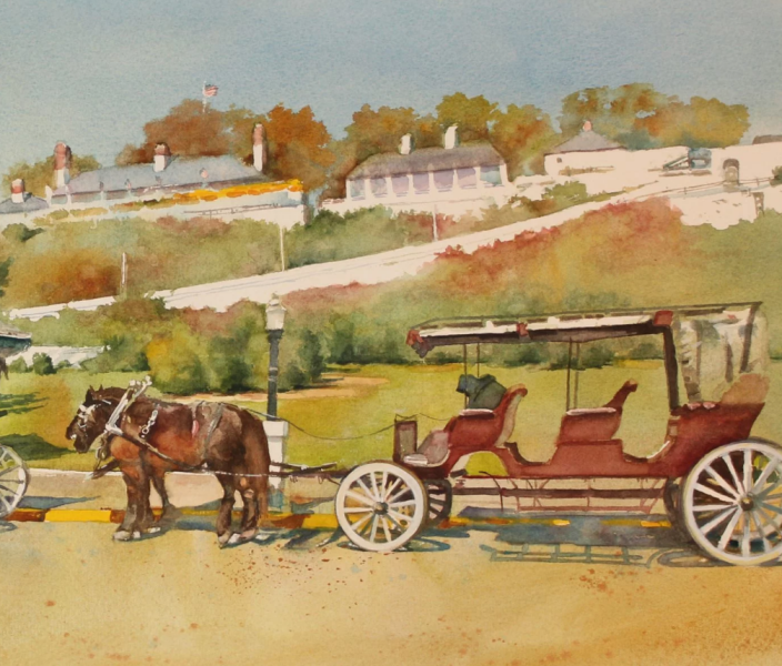 Horse drawn carriage in front of the old fort on the hill